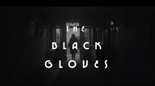the black gloves