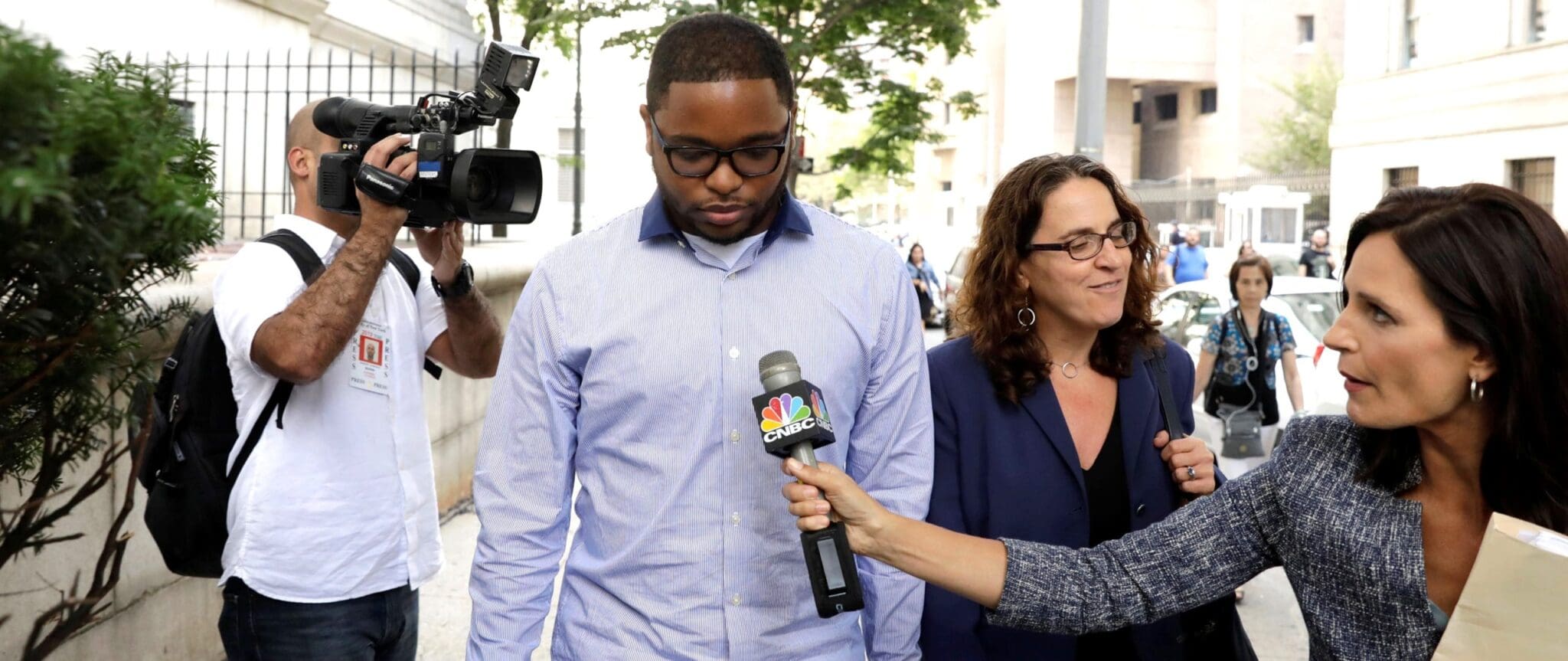 Christian Dawkins, a former ASM Sports agent exits the Manhattan Federal Courthouse, after being arrested for bribery and fraud in connection with college basketball recruiting, in New York